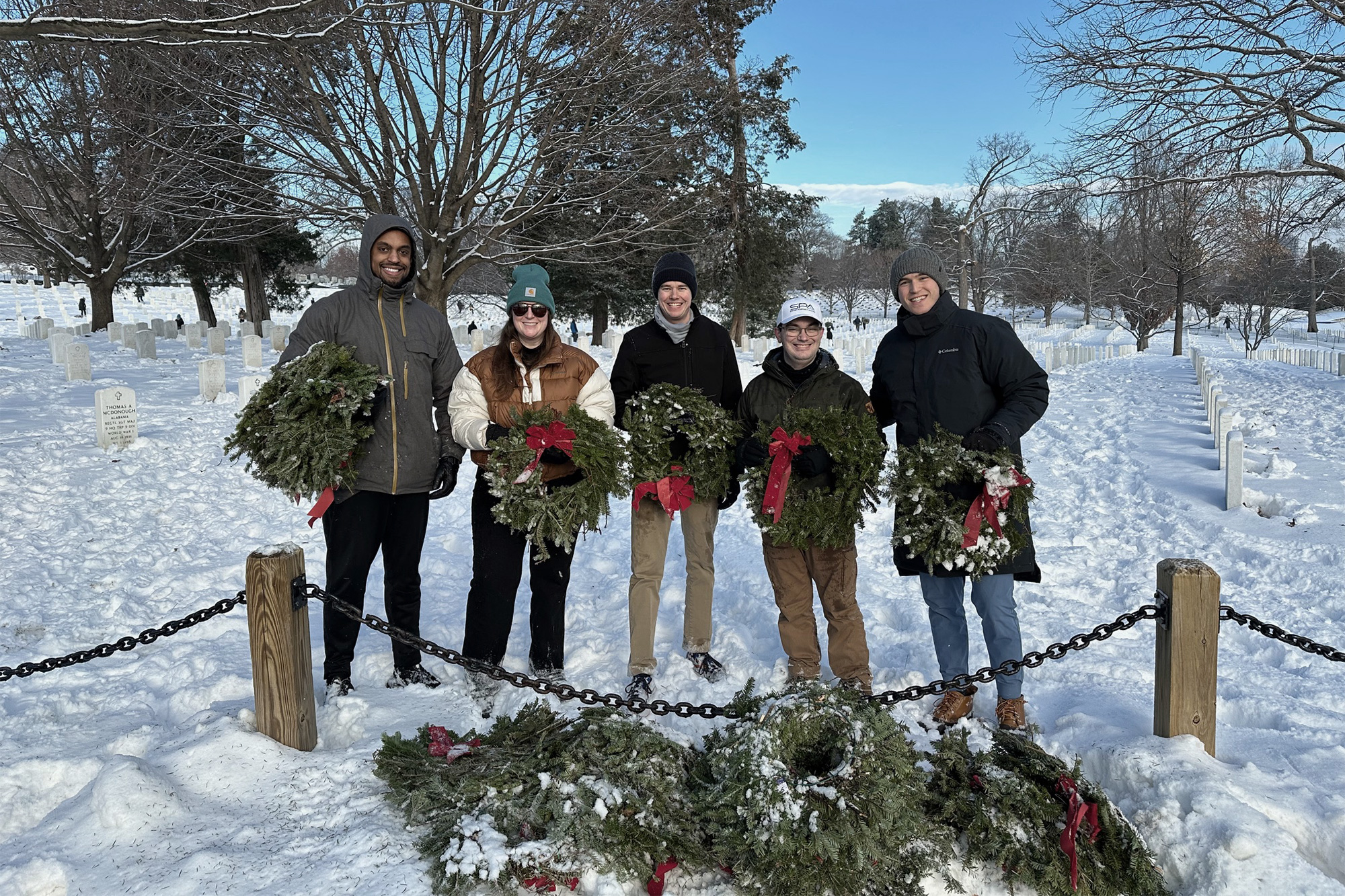 SPA's Young Professionals Group (YPG) and family members participated in the annual "Wreaths Out" event at Arlington National Cemetery.